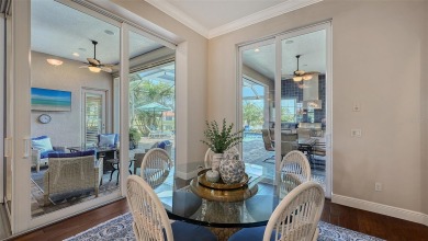 Positioned on a premier homesite with water on two sides and on Ritz-Carlton Members Golf Club in Florida - for sale on GolfHomes.com, golf home, golf lot