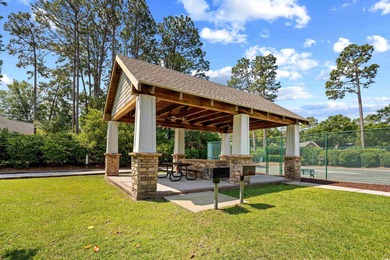 Coastal living in Pawley's Island. Charming home nestled in on The Founders Club At Pawleys Island in South Carolina - for sale on GolfHomes.com, golf home, golf lot