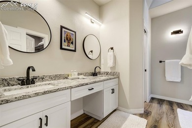 Experience turn-key, main-level living in the gated Kissing on Kissing Camels Golf Course in Colorado - for sale on GolfHomes.com, golf home, golf lot