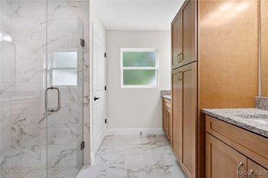 Enjoy the difference that award-winning quality makes in this on Citrus Springs Country Club in Florida - for sale on GolfHomes.com, golf home, golf lot