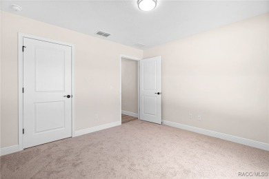 Enjoy the difference that award-winning quality makes in this on Citrus Springs Country Club in Florida - for sale on GolfHomes.com, golf home, golf lot