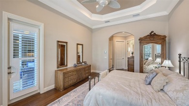 Positioned on a premier homesite with water on two sides and on Ritz-Carlton Members Golf Club in Florida - for sale on GolfHomes.com, golf home, golf lot