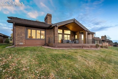 Experience turn-key, main-level living in the gated Kissing on Kissing Camels Golf Course in Colorado - for sale on GolfHomes.com, golf home, golf lot