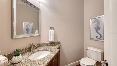 Positioned on a premier homesite with water on two sides and on Ritz-Carlton Members Golf Club in Florida - for sale on GolfHomes.com, golf home, golf lot