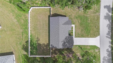 Enjoy the difference that award-winning quality makes in this on Citrus Springs Country Club in Florida - for sale on GolfHomes.com, golf home, golf lot