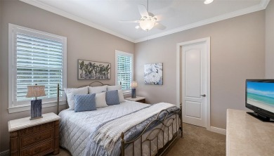 Positioned on a premier homesite with water on two sides and on Ritz-Carlton Members Golf Club in Florida - for sale on GolfHomes.com, golf home, golf lot