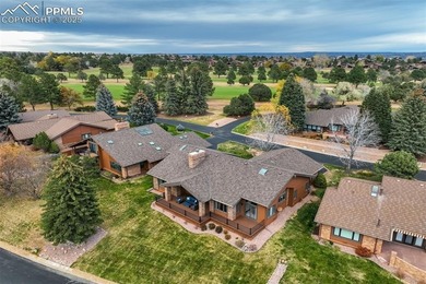 Experience turn-key, main-level living in the gated Kissing on Kissing Camels Golf Course in Colorado - for sale on GolfHomes.com, golf home, golf lot