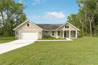 Enjoy the difference that award-winning quality makes in this on Citrus Springs Country Club in Florida - for sale on GolfHomes.com, golf home, golf lot