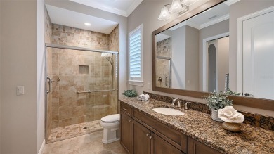 Positioned on a premier homesite with water on two sides and on Ritz-Carlton Members Golf Club in Florida - for sale on GolfHomes.com, golf home, golf lot