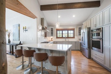 Refined mountain living on the Jack Nicklaus Signature Golf on Breckenridge Golf Club in Colorado - for sale on GolfHomes.com, golf home, golf lot