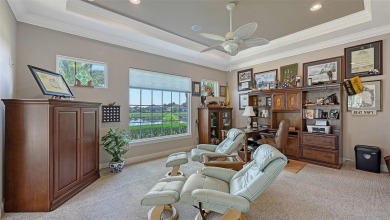 Positioned on a premier homesite with water on two sides and on Ritz-Carlton Members Golf Club in Florida - for sale on GolfHomes.com, golf home, golf lot