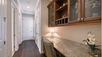 Positioned on a premier homesite with water on two sides and on Ritz-Carlton Members Golf Club in Florida - for sale on GolfHomes.com, golf home, golf lot