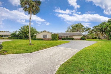 Lovely 3 Bedroom, 2 Bath, 2 Car Garage Home on Cul-de-Sac on BallenIsles Golf and Country Club in Florida - for sale on GolfHomes.com, golf home, golf lot