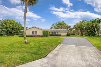 Lovely 3 Bedroom, 2 Bath, 2 Car Garage Home on Cul-de-Sac on BallenIsles Golf and Country Club in Florida - for sale on GolfHomes.com, golf home, golf lot