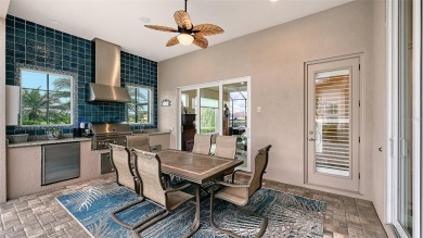 Positioned on a premier homesite with water on two sides and on Ritz-Carlton Members Golf Club in Florida - for sale on GolfHomes.com, golf home, golf lot
