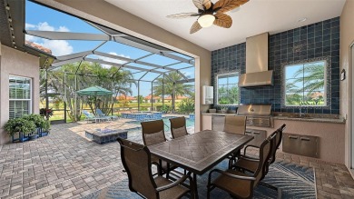Positioned on a premier homesite with water on two sides and on Ritz-Carlton Members Golf Club in Florida - for sale on GolfHomes.com, golf home, golf lot