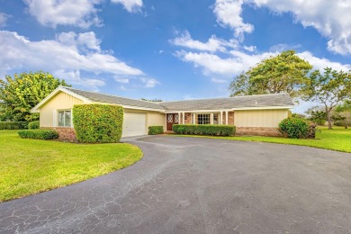 Lovely 3 Bedroom, 2 Bath, 2 Car Garage Home on Cul-de-Sac on BallenIsles Golf and Country Club in Florida - for sale on GolfHomes.com, golf home, golf lot