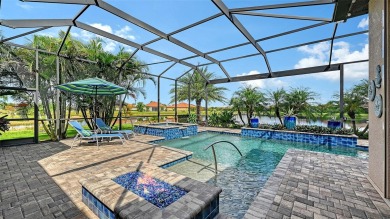 Positioned on a premier homesite with water on two sides and on Ritz-Carlton Members Golf Club in Florida - for sale on GolfHomes.com, golf home, golf lot