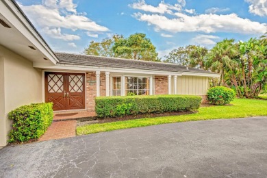 Lovely 3 Bedroom, 2 Bath, 2 Car Garage Home on Cul-de-Sac on BallenIsles Golf and Country Club in Florida - for sale on GolfHomes.com, golf home, golf lot