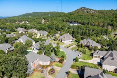 This beautiful 5-bed, 3.5-bath home, located in the exclusive on Chenal Country Club - Bear Den Mountain in Arkansas - for sale on GolfHomes.com, golf home, golf lot