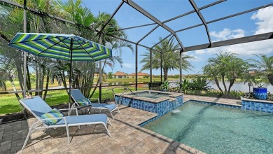 Positioned on a premier homesite with water on two sides and on Ritz-Carlton Members Golf Club in Florida - for sale on GolfHomes.com, golf home, golf lot