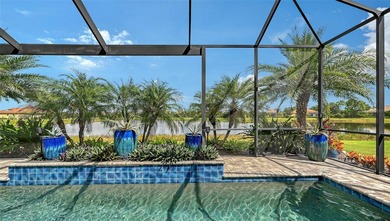 Positioned on a premier homesite with water on two sides and on Ritz-Carlton Members Golf Club in Florida - for sale on GolfHomes.com, golf home, golf lot