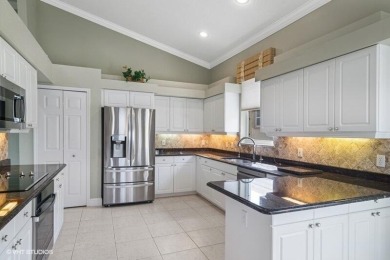 TAKE A SECOND LOOK!NEW ROOF & GUTTERS FEB. 2025! NEW SS OVEN on PGA Golf Club in PGA Village in Florida - for sale on GolfHomes.com, golf home, golf lot