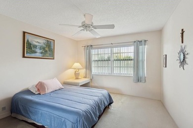 2-bed, 2-bath golf-view condo in the desirable all-ages Palm on Palm-Aire Country Club and Resort - The Oaks in Florida - for sale on GolfHomes.com, golf home, golf lot