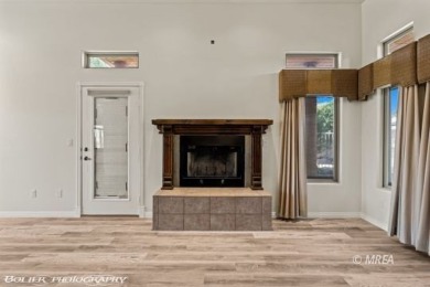 Welcome to 920 Vista Del Sol Ct, a stunning 2,119 SF two-story on The Oasis Golf Club in Nevada - for sale on GolfHomes.com, golf home, golf lot