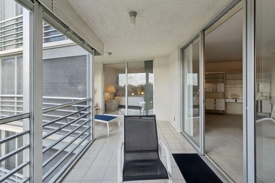 2-bed, 2-bath golf-view condo in the desirable all-ages Palm on Palm-Aire Country Club and Resort - The Oaks in Florida - for sale on GolfHomes.com, golf home, golf lot