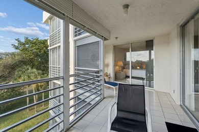 2-bed, 2-bath golf-view condo in the desirable all-ages Palm on Palm-Aire Country Club and Resort - The Oaks in Florida - for sale on GolfHomes.com, golf home, golf lot