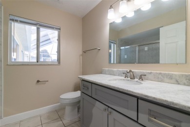 Under contract-accepting backup offers. TOTALY REMODELED POOL & on Ocala Palms Golf and Country Club in Florida - for sale on GolfHomes.com, golf home, golf lot
