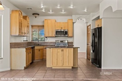 Welcome to 920 Vista Del Sol Ct, a stunning 2,119 SF two-story on The Oasis Golf Club in Nevada - for sale on GolfHomes.com, golf home, golf lot