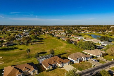 Under contract-accepting backup offers. TOTALY REMODELED POOL & on Ocala Palms Golf and Country Club in Florida - for sale on GolfHomes.com, golf home, golf lot