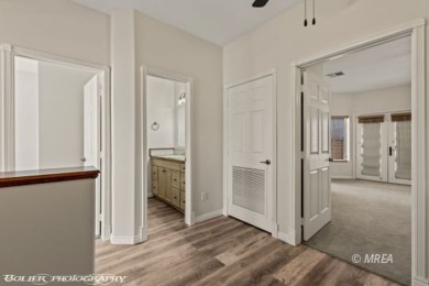 Welcome to 920 Vista Del Sol Ct, a stunning 2,119 SF two-story on The Oasis Golf Club in Nevada - for sale on GolfHomes.com, golf home, golf lot
