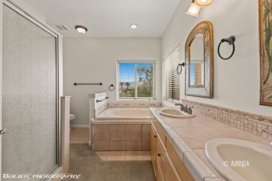 Welcome to 920 Vista Del Sol Ct, a stunning 2,119 SF two-story on The Oasis Golf Club in Nevada - for sale on GolfHomes.com, golf home, golf lot