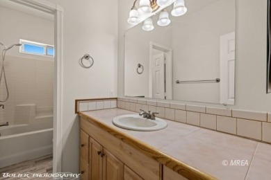 Welcome to 920 Vista Del Sol Ct, a stunning 2,119 SF two-story on The Oasis Golf Club in Nevada - for sale on GolfHomes.com, golf home, golf lot