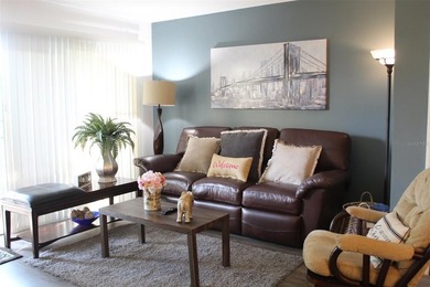 Welcome to this charming 2-bedroom, 2.5-bath condominium located on Errol Estates Country Club in Florida - for sale on GolfHomes.com, golf home, golf lot