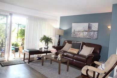 Welcome to this charming 2-bedroom, 2.5-bath condominium located on Errol Estates Country Club in Florida - for sale on GolfHomes.com, golf home, golf lot