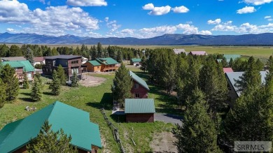 Escape to serene Island Park, Idaho, and stay at our cozy on Island Park Village Resort Golf Course in Idaho - for sale on GolfHomes.com, golf home, golf lot