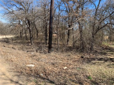 Flat lot ready to build your dream home on it. Near Bridgeport on The Club At Runaway Bay in Texas - for sale on GolfHomes.com, golf home, golf lot