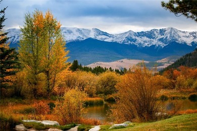 Set on 14 pristine acres along the Swan River, 2717 Tiger Road on Breckenridge Golf Club in Colorado - for sale on GolfHomes.com, golf home, golf lot