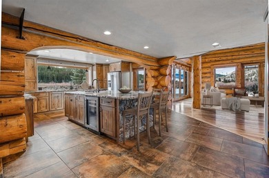 Set on 14 pristine acres along the Swan River, 2717 Tiger Road on Breckenridge Golf Club in Colorado - for sale on GolfHomes.com, golf home, golf lot