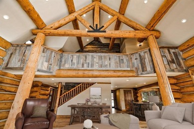 Set on 14 pristine acres along the Swan River, 2717 Tiger Road on Breckenridge Golf Club in Colorado - for sale on GolfHomes.com, golf home, golf lot