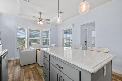 Discover resort-style living close to the shores of Lake on Blue Cypress Golf and RV Resort in Florida - for sale on GolfHomes.com, golf home, golf lot