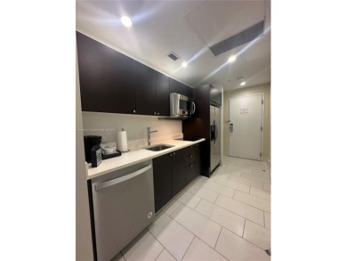 Fully furnished studio for sale in the heart of Downtown Doral! on Doral Golf Resort in Florida - for sale on GolfHomes.com, golf home, golf lot