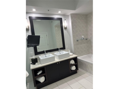 Fully furnished studio for sale in the heart of Downtown Doral! on Doral Golf Resort in Florida - for sale on GolfHomes.com, golf home, golf lot
