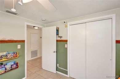 Nestled in a serene and quiet neighborhood, this meticulously on Plantation Inn and Golf Resort  in Florida - for sale on GolfHomes.com, golf home, golf lot