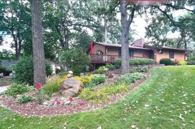 You are going to love this! Fabulous location with views of on McHenry Country Club in Illinois - for sale on GolfHomes.com, golf home, golf lot