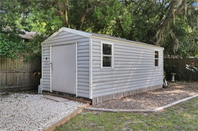 Nestled in a serene and quiet neighborhood, this meticulously on Plantation Inn and Golf Resort  in Florida - for sale on GolfHomes.com, golf home, golf lot
